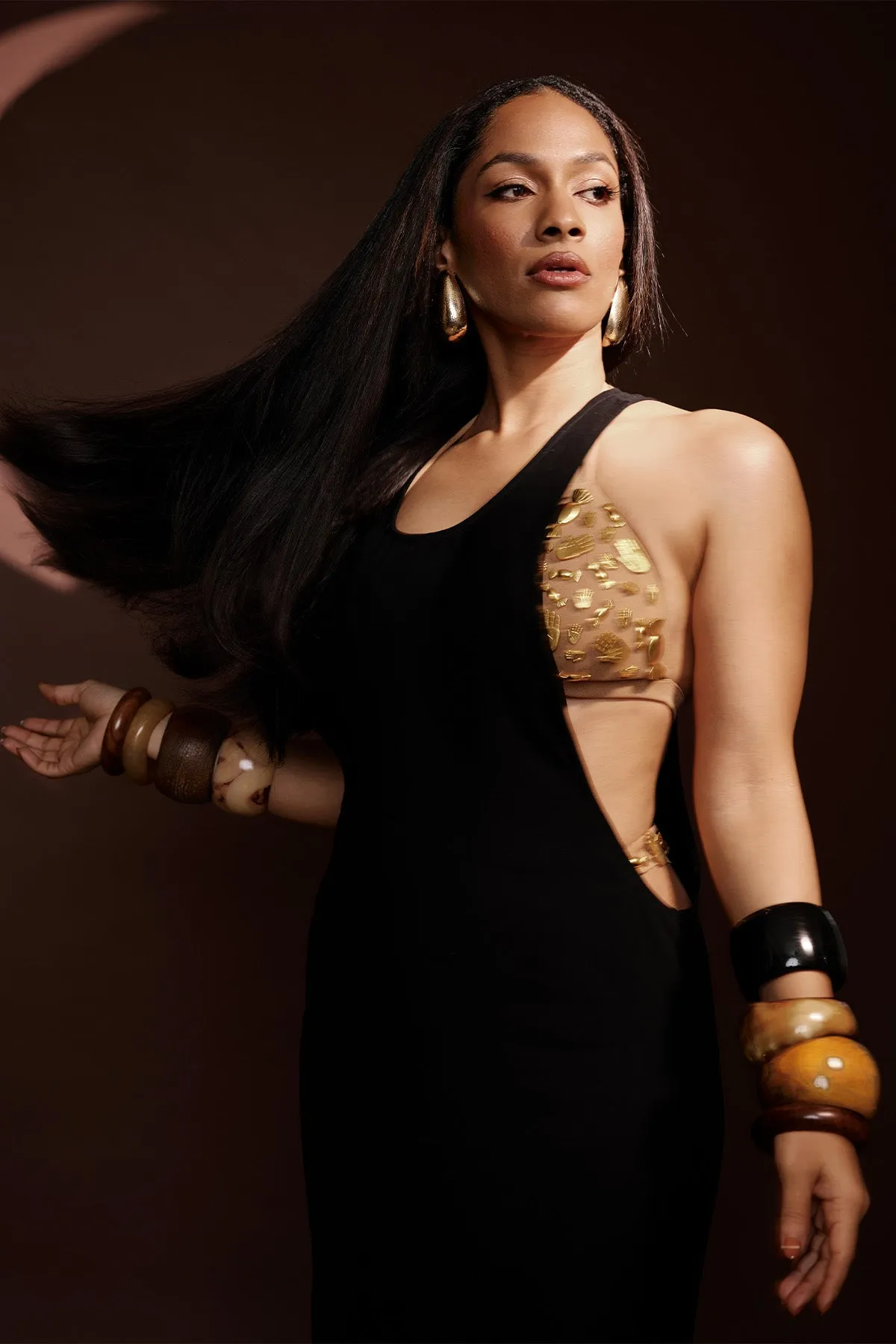 Black dress with ruby bra and whip