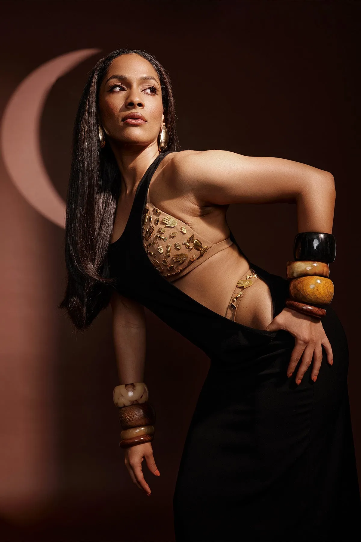 Black dress with ruby bra and whip