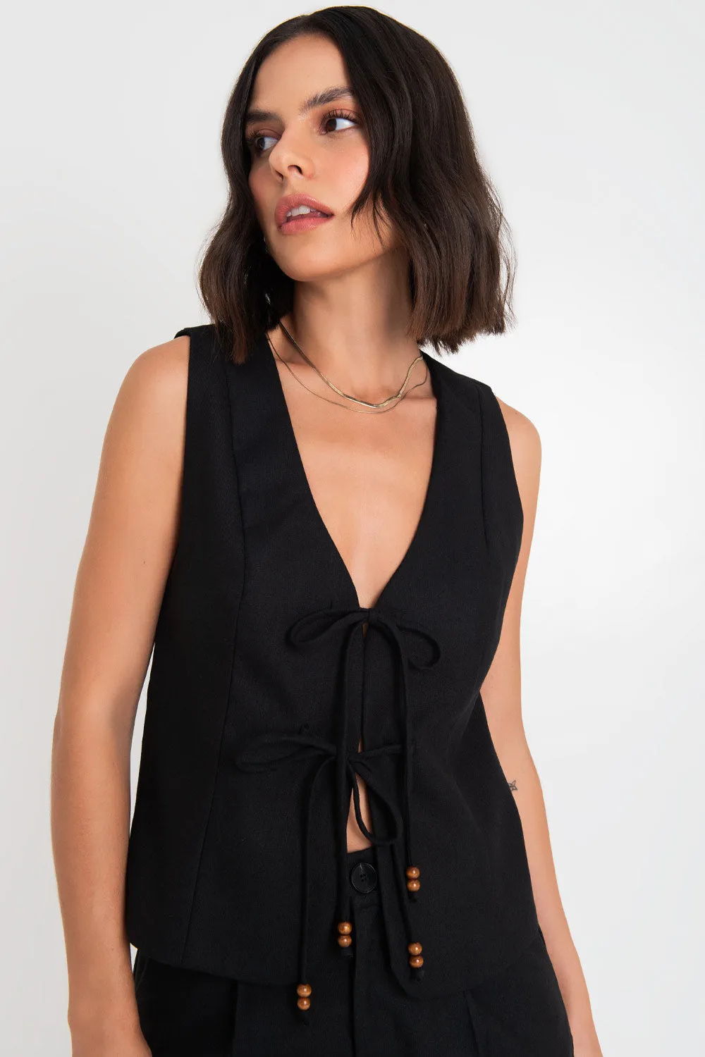 Blusa sin mangas escote con lazos en contraste