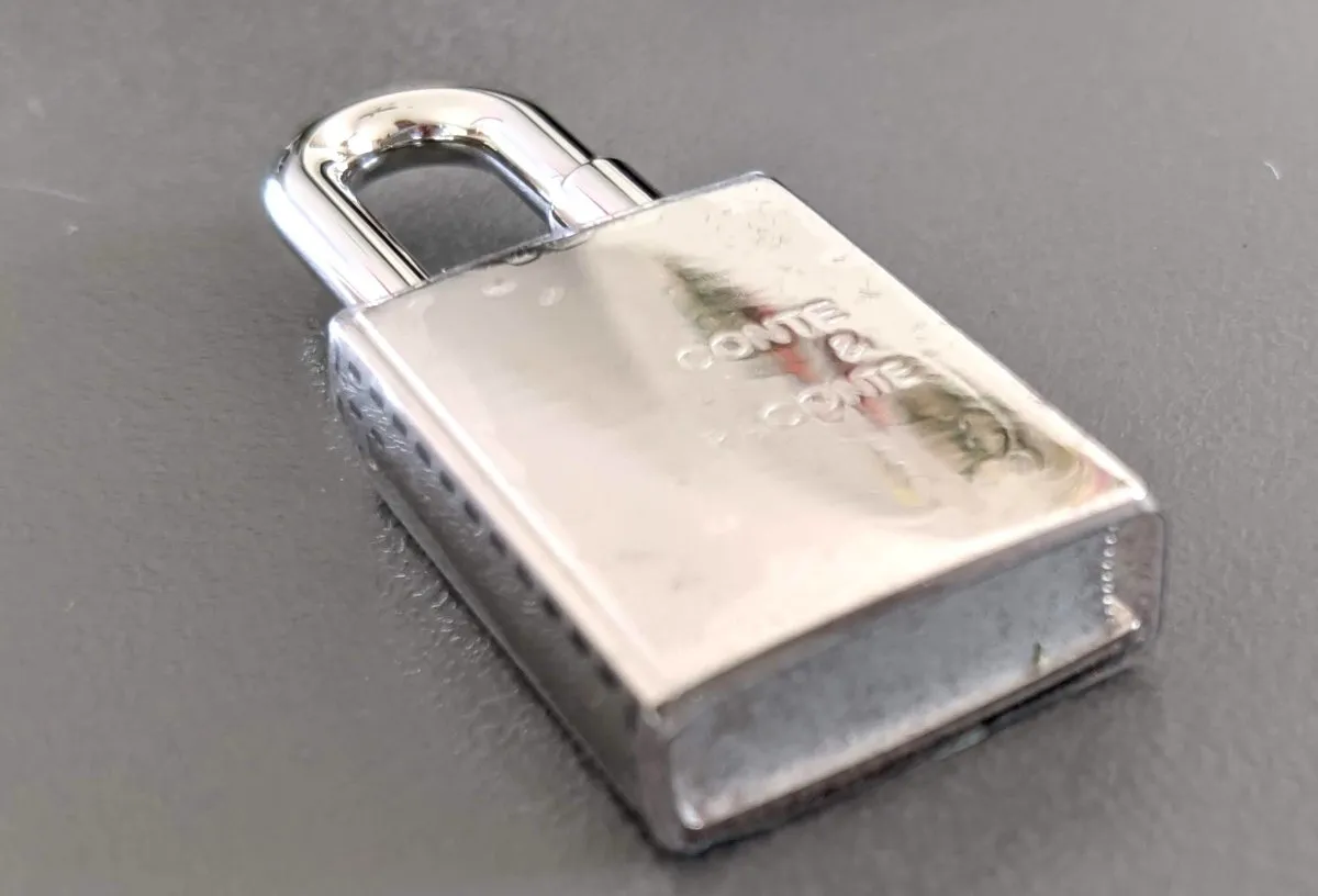 Hermes Silvered CONTE ET RACONTE Cadenas Lock Charm Brand New in Box!