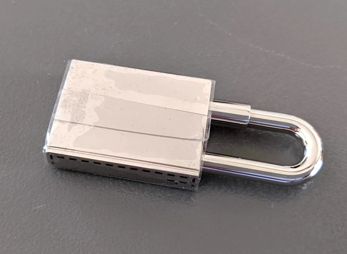 Hermes Silvered CONTE ET RACONTE Cadenas Lock Charm Brand New in Box!