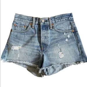 Levi’s 501 mid rise light wash distressed jean shorts size 25