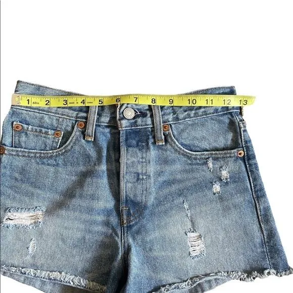 Levi’s 501 mid rise light wash distressed jean shorts size 25