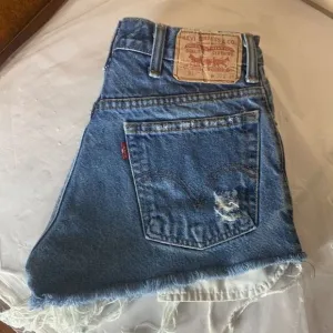 Levi’s High Waist Cut Off Distressed Jean Shorts