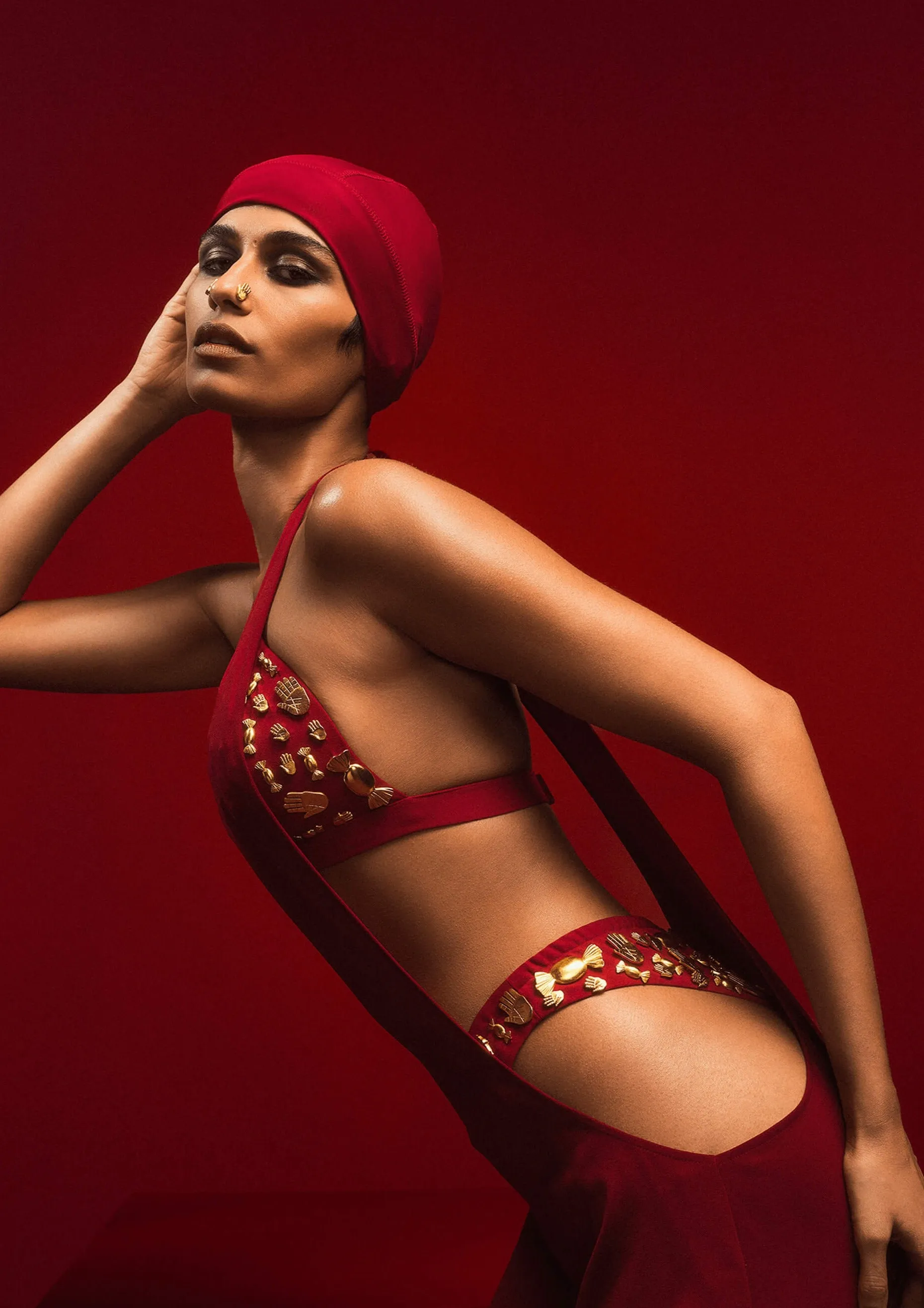 Red dress with ruby bra and whip