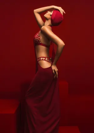 Red dress with ruby bra and whip