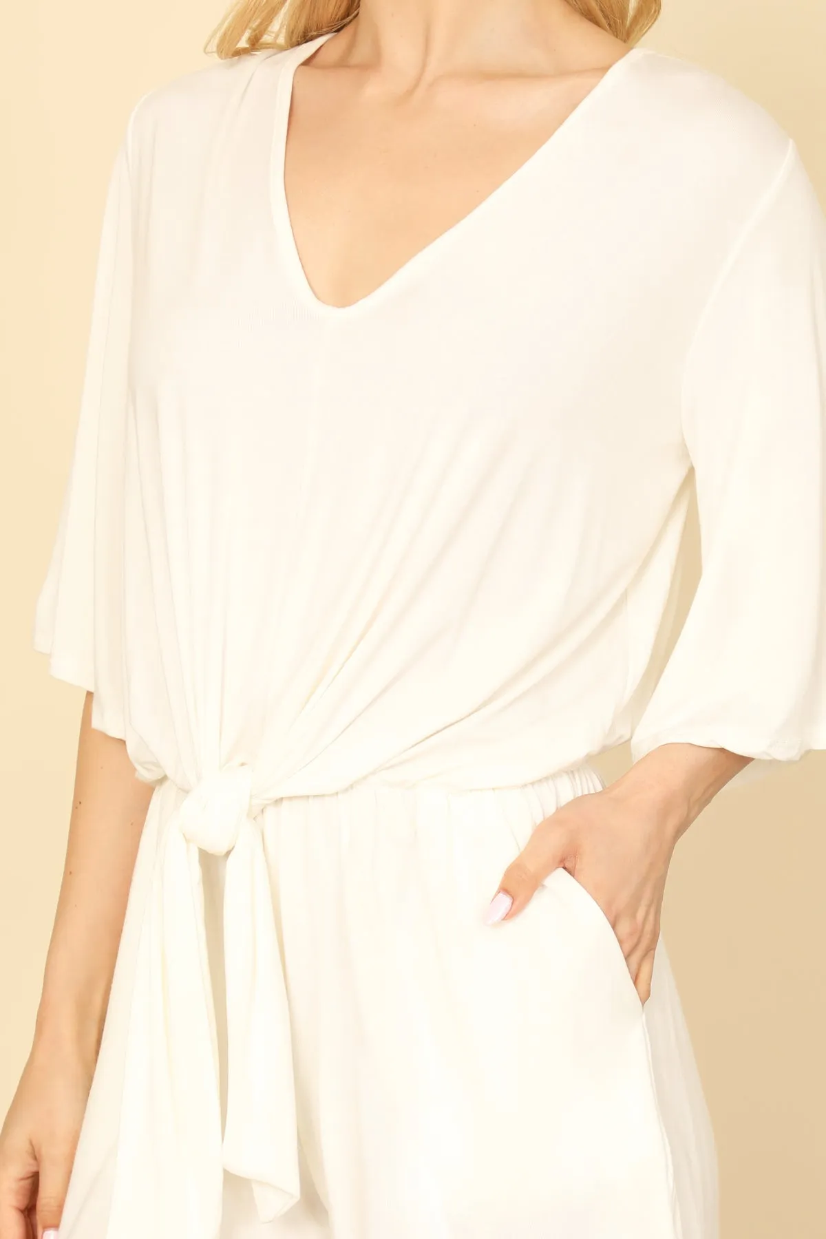 V-NECK BELL SLEEVE FRONT TIE SOLID ROMPER